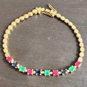 Watch Video / 14K Gold Ruby, Emerald, Sapphire & Diamond Tennis Bracelet